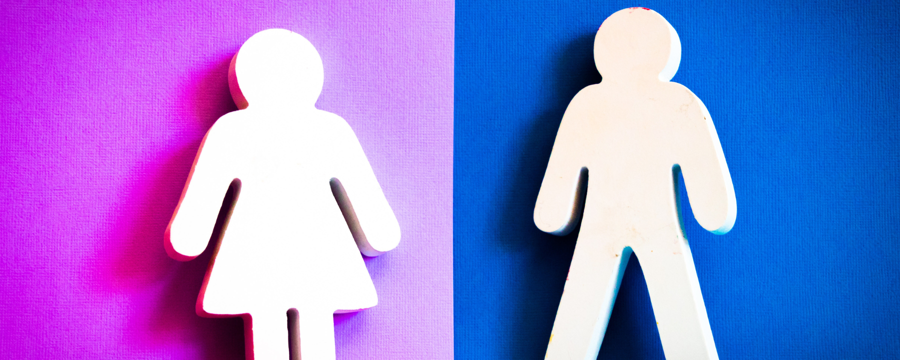 Stereotypical female and male cutout shapes on different coloured backgrounds to illustrate gender differences. Source: Pexels Magda Ehlers
